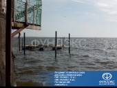 Пирс в Азовском море на винтовых сваях